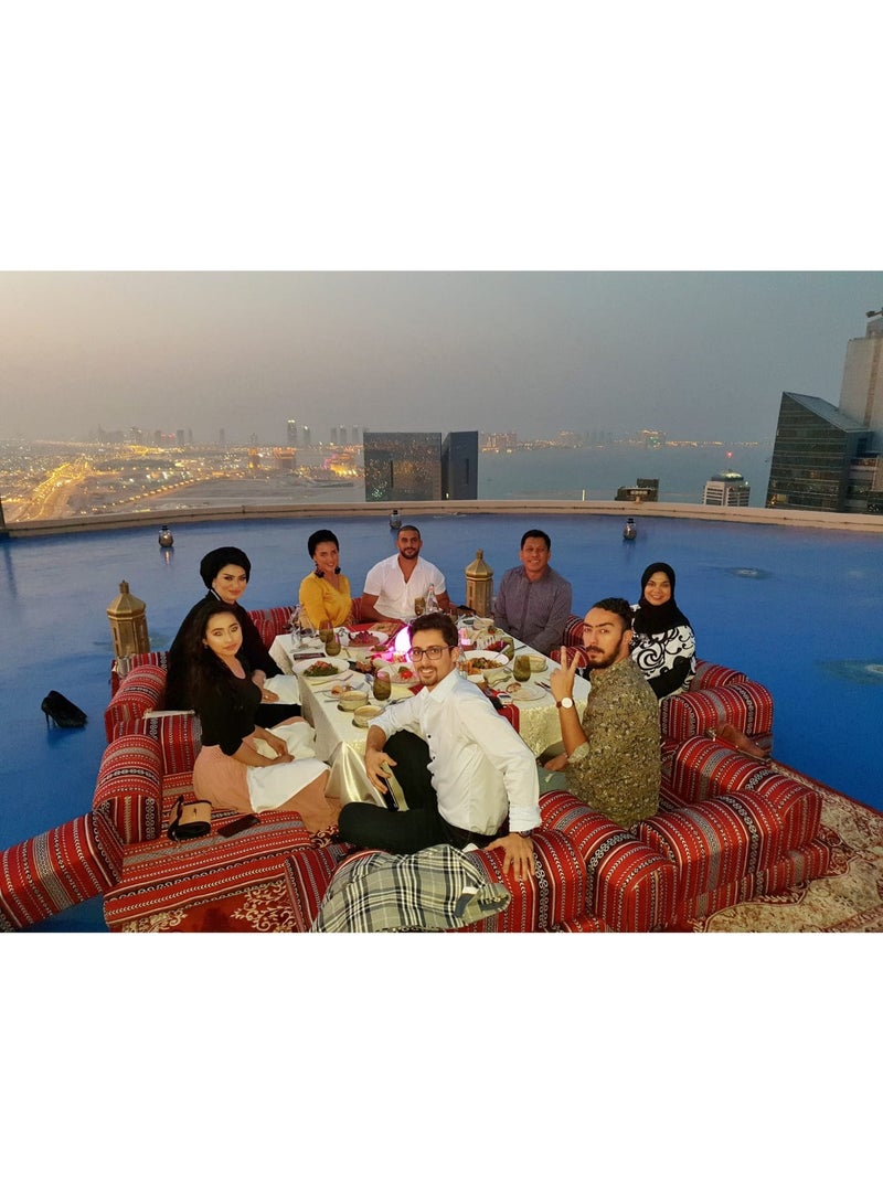 Xboat Traditional Arabic Majlis Floor Seating Set Elegant Arabic Majlis floor seating set featuring comfortable red patterned cushions arranged around a central . Ideal for dining, gatherings, Ramadan, and cultural events. Suitable for indoor and outdoor use including homes, rooftops, and event setups. Perfect for creating a warm and traditional hospitality experience. - Image 4